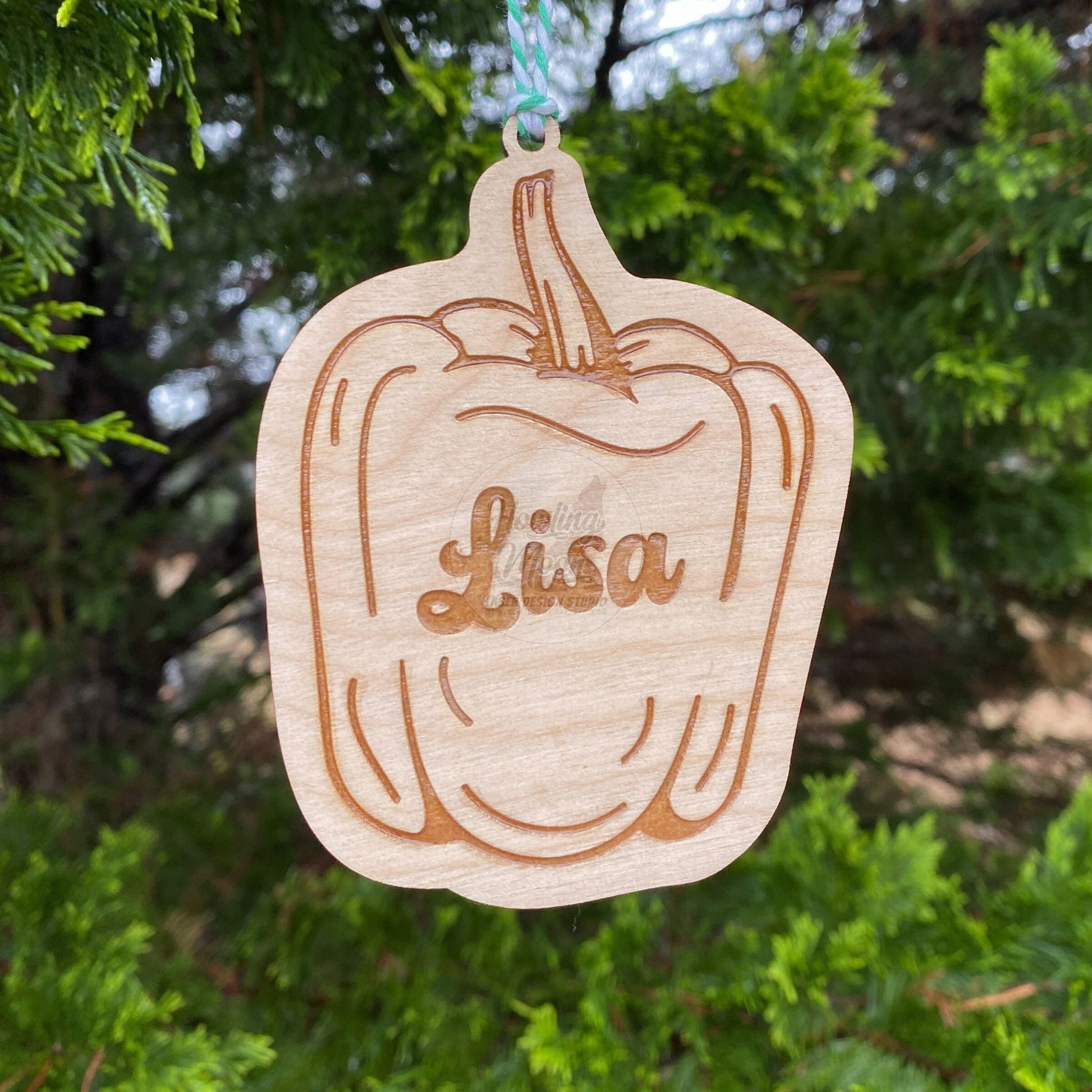Personalized bell pepper ornaments handcrafted from natural wood made in Virginia USA by Howling Moon Laser Design Studio.