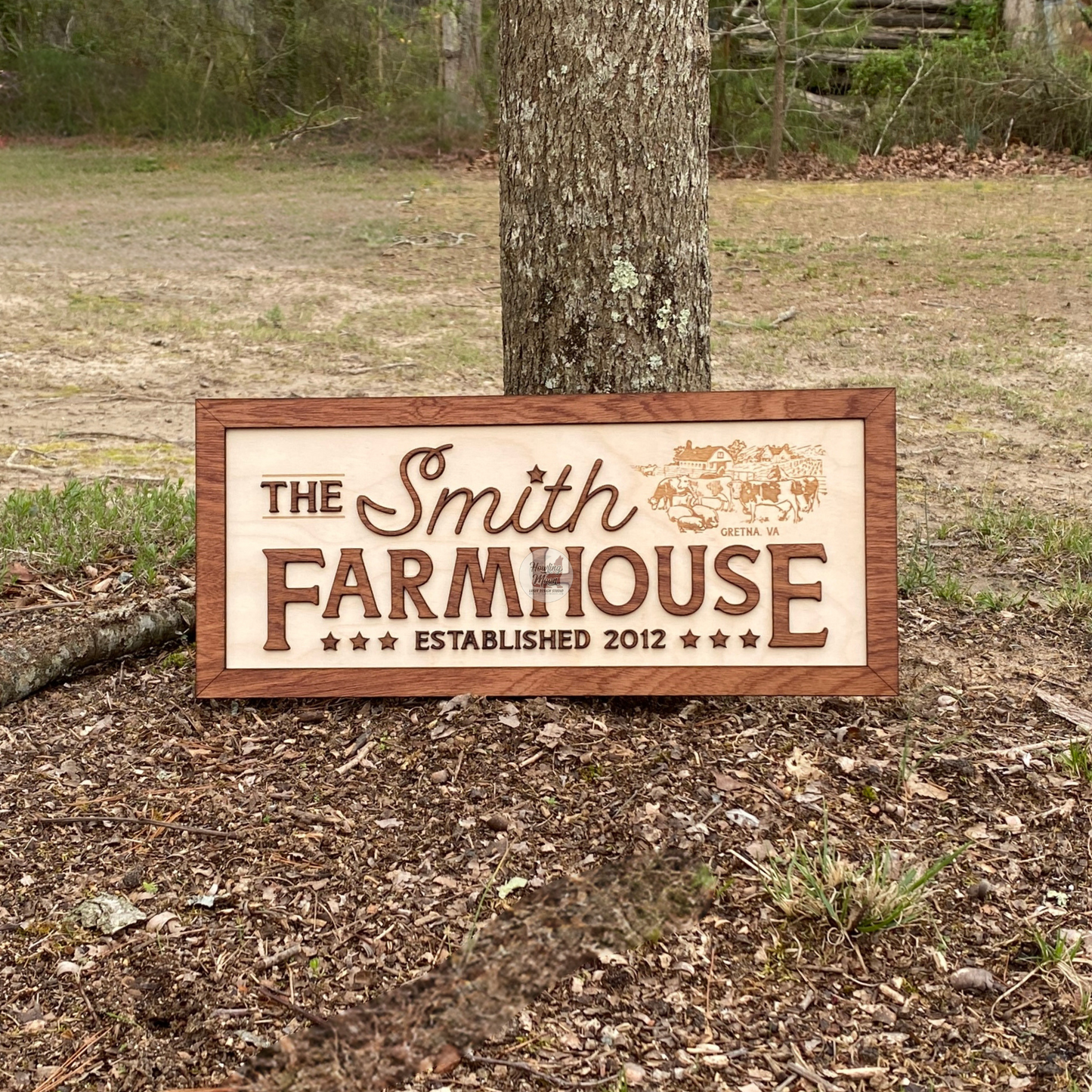 Family Farmhouse Sign from Howling Moon Laser Design propped up against a tree